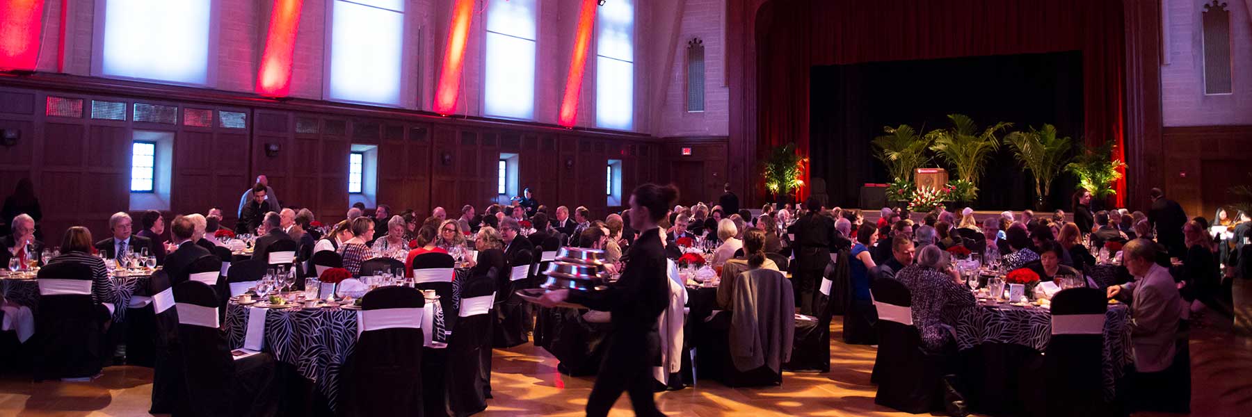Guests attend a formal event at Alumni Hall in the Indiana Memorial Union.