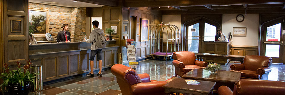 A guest checks in at the Biddle Hotel in the Indiana Memorial Union. 